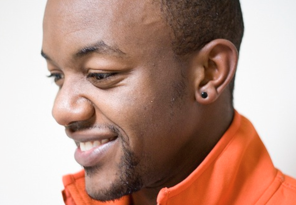 Black Hole Body Piercing client displays ear piercing